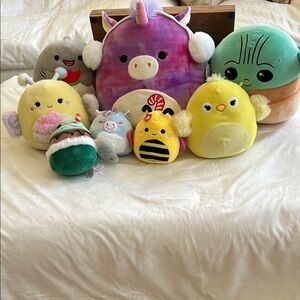 Squishmallow collection featuring Yoda.